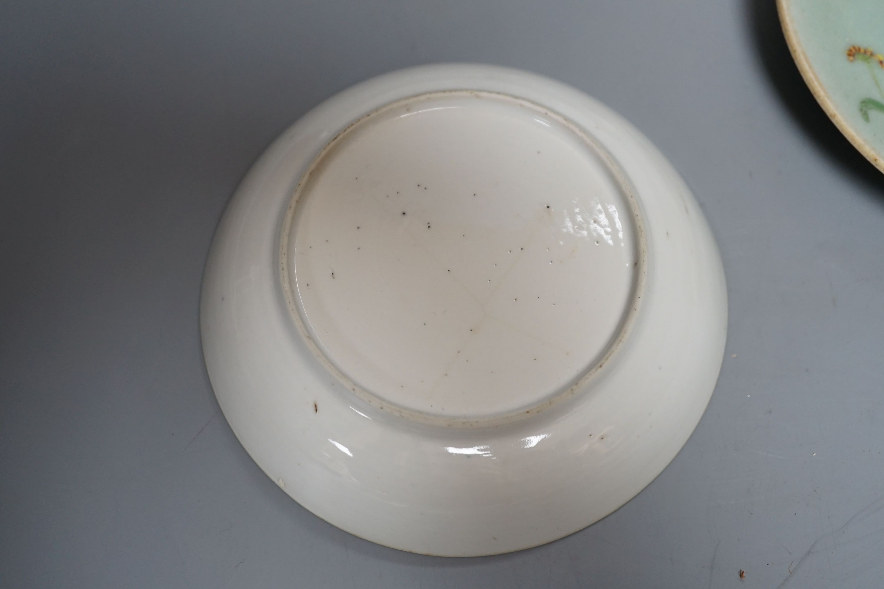 A Chinese export blue and white dish, 13cm, similar vase, a miniature crackle ware vase and a celadon saucer